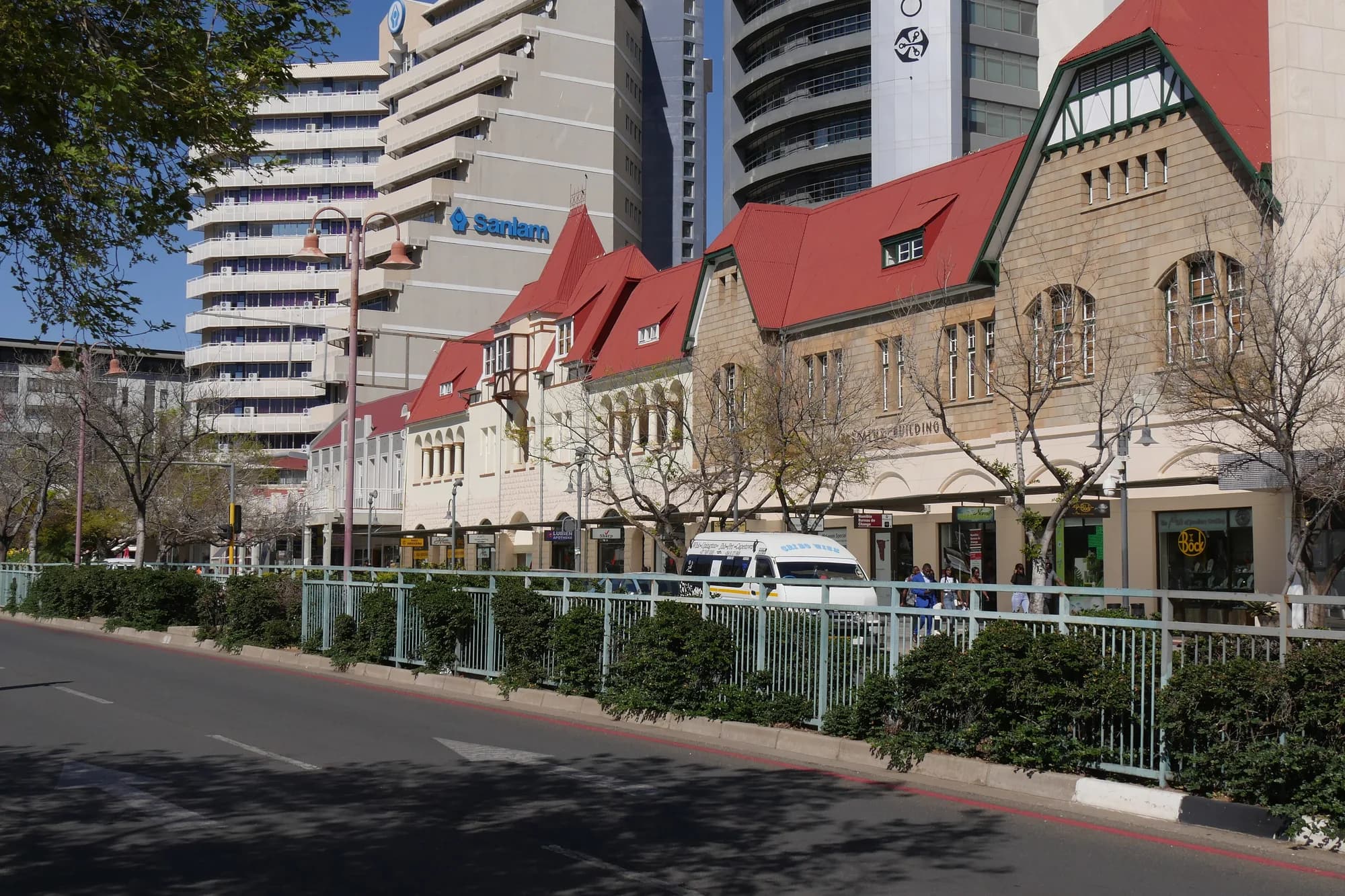 Red-roofed older buildings and office towers on Independence Avenue, Windhoek