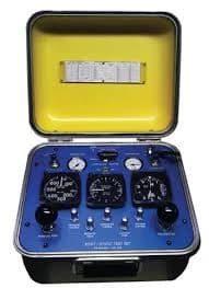 A pitot-static test set in its open carrying case